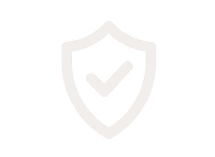 A faint shield with a checkmark inside on a light background.