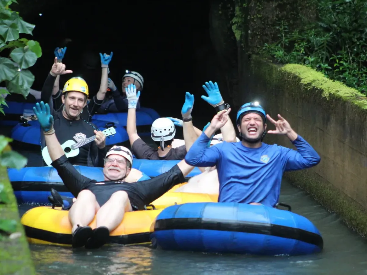 a group of people riding on the back of a boat