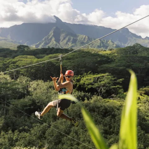 a man standing on top of a mountain