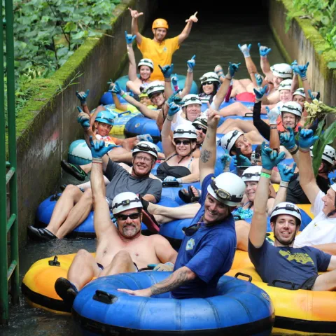 a group of people on a raft