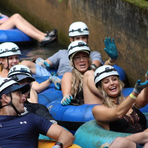 a group of people riding on the back of a person